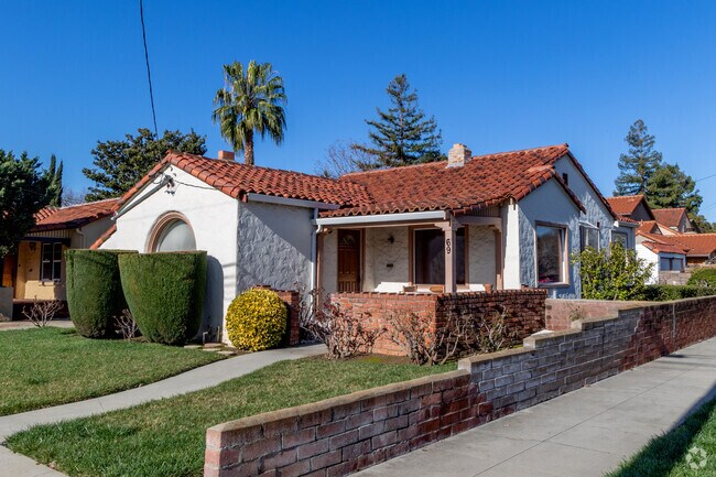Spanish bungalow style homes often feature red-tile roofs and arched doorways in Hyde Park.