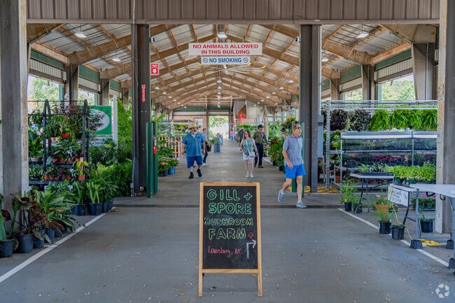 Avent West residents enjoy fresh produce and more at the State Farmers Market.