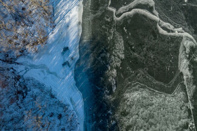 Enjoy the scenic view of the Mississippi Gorge Regional Park River in Howe.