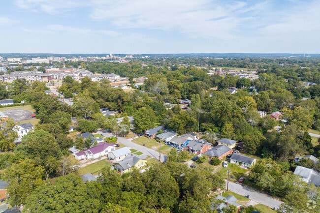 The mature trees of Turpin Hill offer shade to its residents on hot summer days.