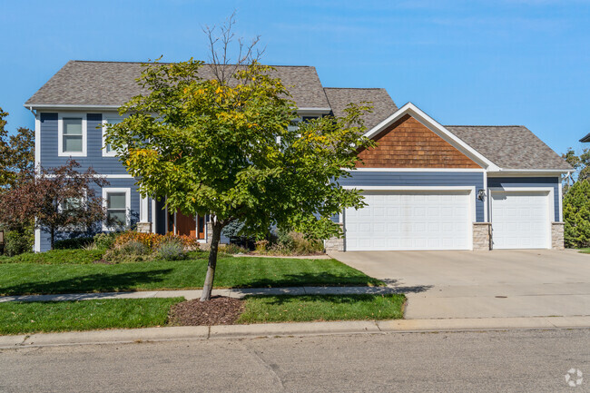 Pine Ridge offers a serene, wooded setting with spacious homes and scenic cul-de-sacs.