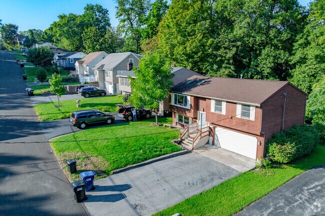 Hilly residential streets in Winkworth are lined with plenty of bi-level, split-level, and ranch-style homes.