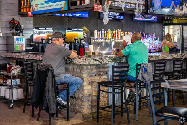 Grab a bite to eat from BackPorch Drafthouse in Pecan Valley.