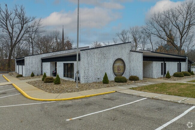 Enjoy a glass of wine at CharBeany's Wine on the River near Historic Perkins.