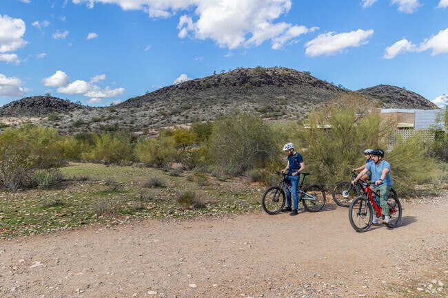Mountain bikers gear up for trails in North Mountain Village.