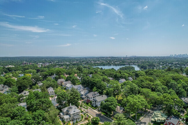 The Arlington Center neighborhood overview with the downtown Boston skyline in the distance.