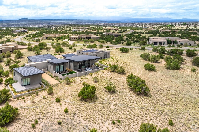HIlly terrain seprates the Las Campanas homes selling between $1.1 and $5 million.