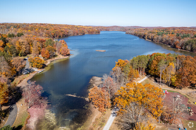 Chadwick Lake Park mirrors the  sky within the neighborhood of Newburgh.