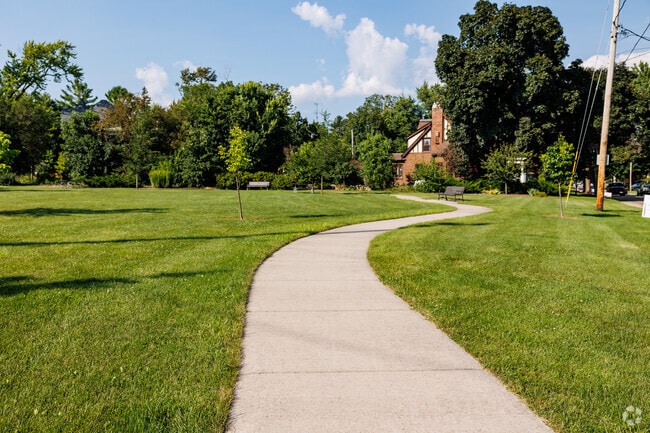 A paved walking trail weaves it's way through Pioneer Park.