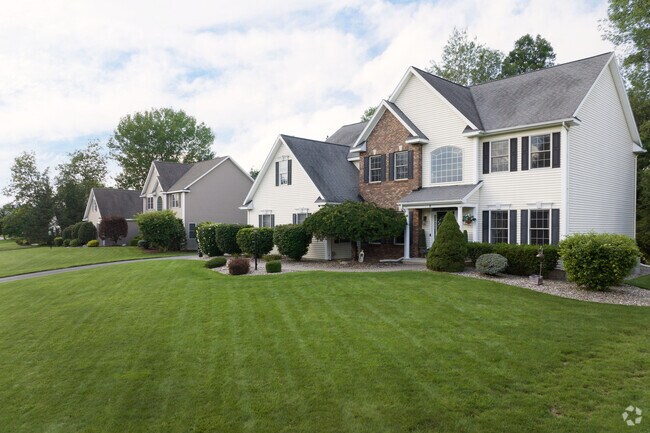 Two new colonials sit ready for dreams to be made in.