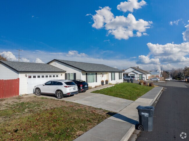Single-story ranch homes sit along a quiet Connell street.
