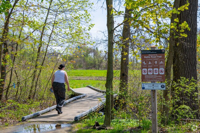 Walk along the Battle Road Trail at Minuteman National Park in Concord.