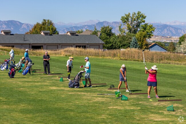 Practice your swing at the Legacy Ridge Golf Course driving range.