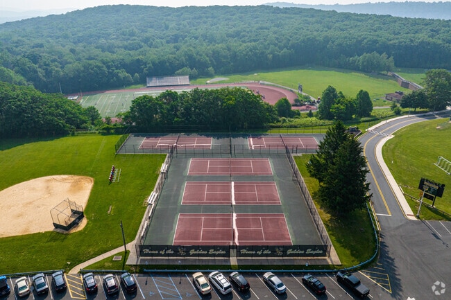 Aerial view of tennis courts at Morris Knolls High School.
