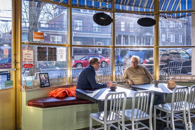 Brighton Heights residents enjoying good conversation and a hot drink at California Coffee Bar.