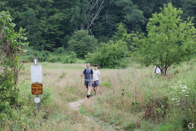 Hikers come off of the infamous 