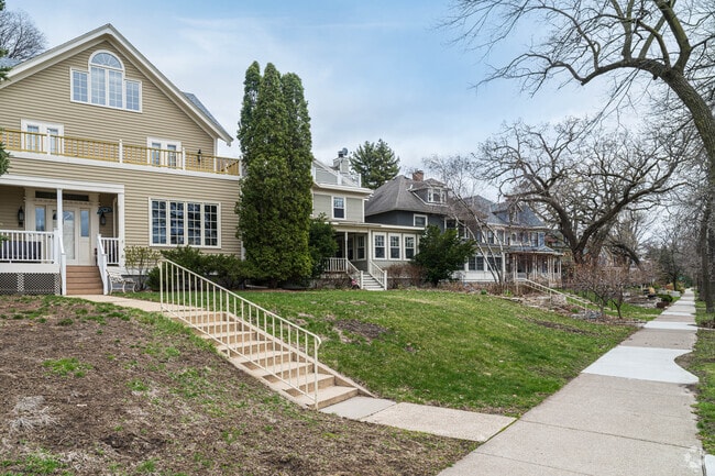 A row of homes along the parkway facing the lake in the Bde Maka Ska neighborhood.