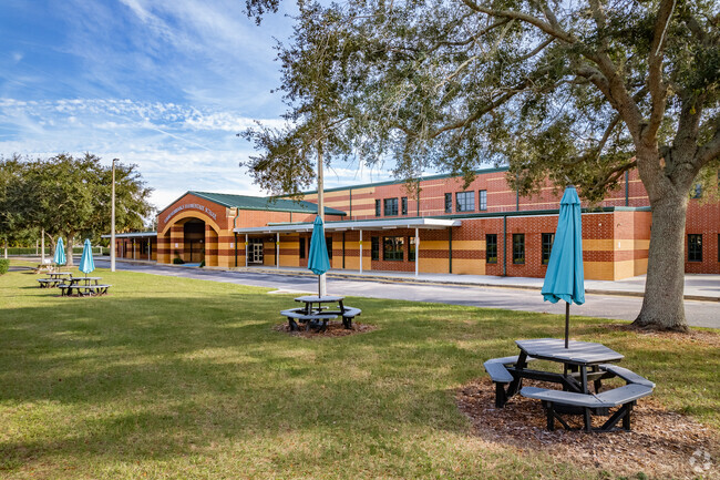 Student enjoy their lunch out on the picnic tables at Thornebrooke Elementary School.