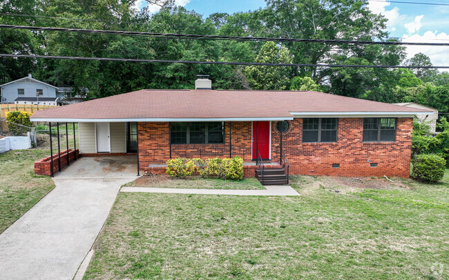 A brink rancher with a covered car port and generous lot in Lakemont in Augusta.