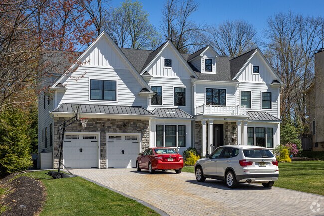Newly built contemporary homes in Berkeley Heights are slowly replacing mid-century styles.