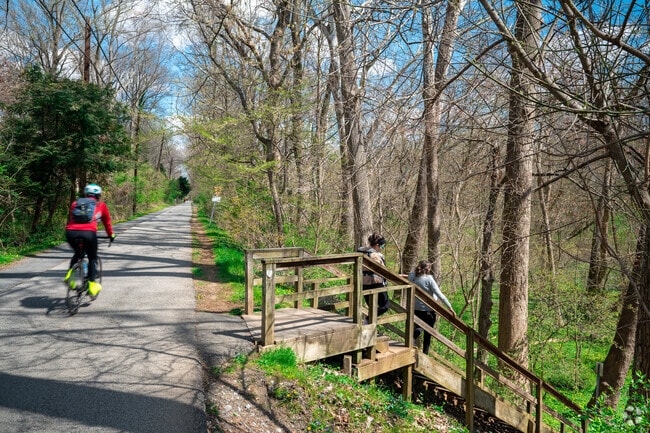 A bike path runs through Little Falls Stream Valley Park, just outside of Sumner.