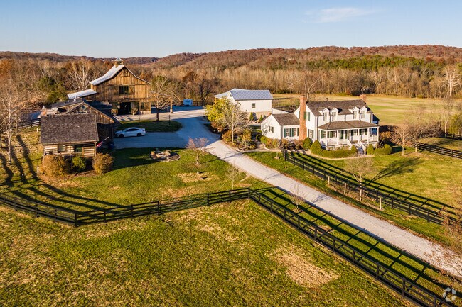 There are several large contemporary farmhouses on 10-acre lots in Defiance, MO.