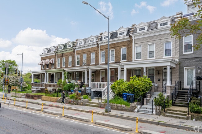 A row of classic DC Wardman row homes on Quebec Pl NW in Park View.
