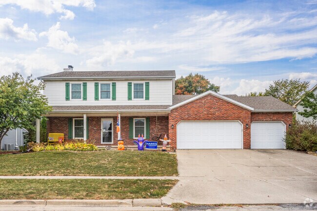 Most homes in Old Farm Lakes feature multi-car garages and green space.