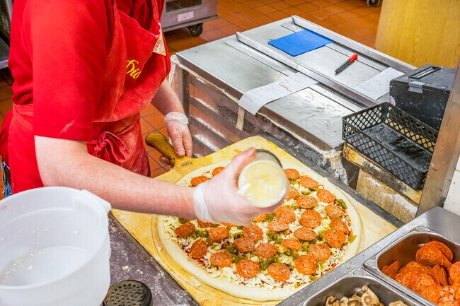 You will enjoy the hand-crafted pizzas from Dion’s Pizza in High Range.