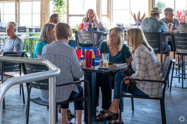 Ellison Acres locals love to spend time together on the patio area at Half Wall Brewery.