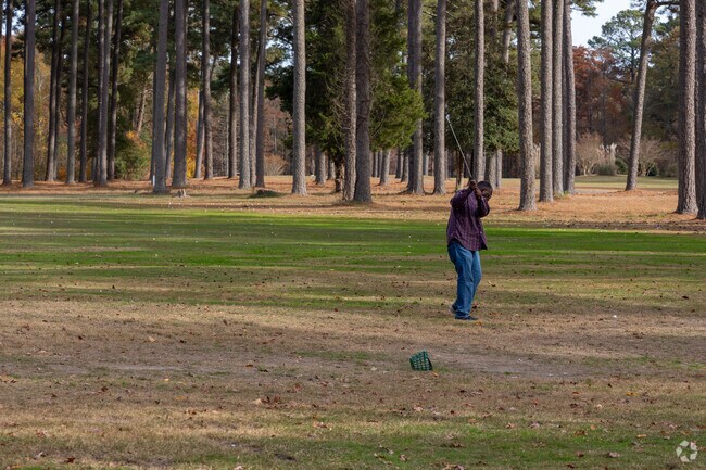 The driving range at Suffolk Golf Course near Cyprus is perfect for practicing your swing.