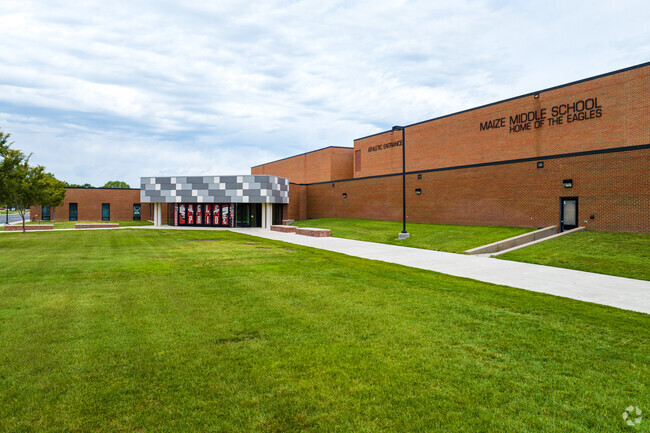 There is plenty of greenery and sidewalks surrounding Maize Middle School.