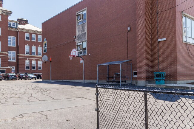 Kids cal play ball at Paul Cuffee Middle School in West End, Providence.