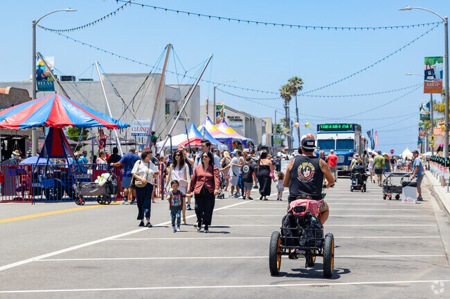 Ride your bike down to the Riviera Village Summer Festival.