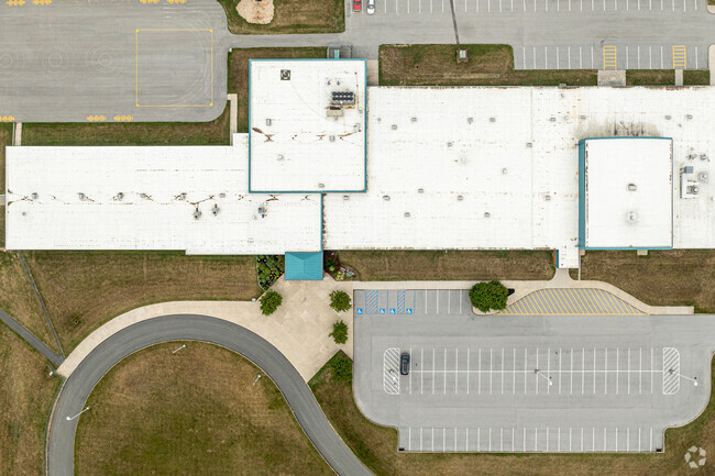 Pleasant View Elementary School's entry shows off its curves and landscaping as visitors arrive.