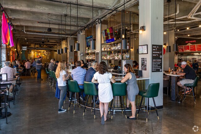 Fuel & Iron Food Hall near Hyde Park is a casual collection of eateries and a central bar.