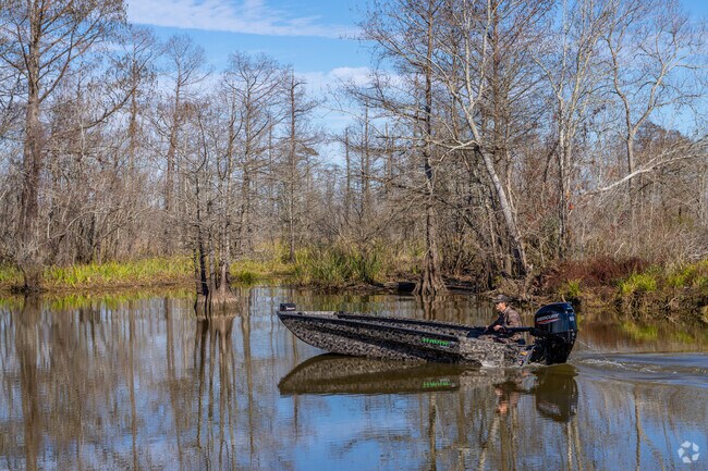 A young Orange, TX resident enjoys boating among the cities waterways.