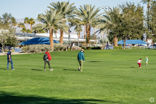 The Lakes residents enjoy the grassy fields at the Civic Center Park.