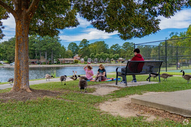 Area residents commune with the waterfowl at Angier Recreation Park.