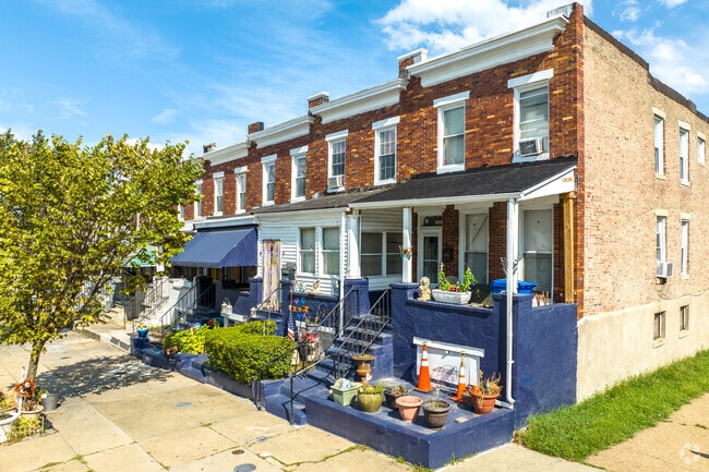 Homes in Westport have beautiful shrubbery outside of their houses.