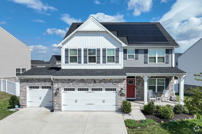New traditional homes with multi car garages are found throughout Bull Run area.