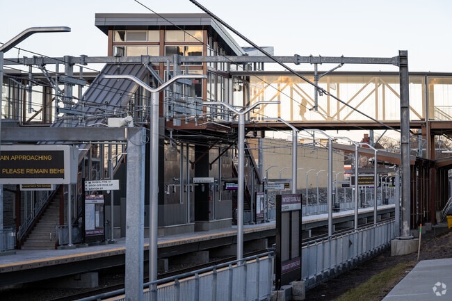 Embarking on a journey via commuter rail in Pawtucket, RI, near Darlington.