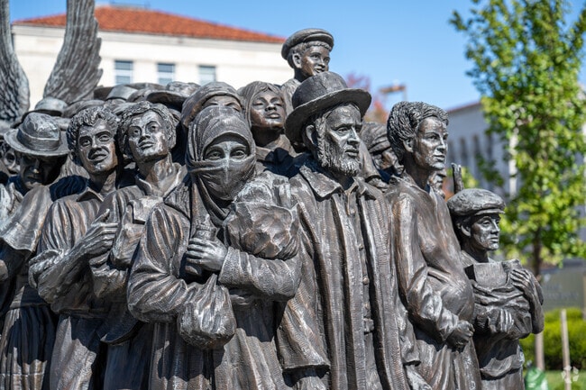 The Angels Unawares statue greets visitors to Catholic University.