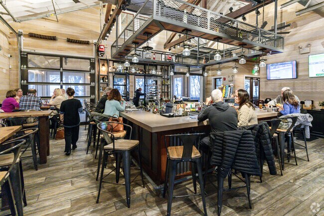 Just minutes from Echo Farms-Rivers Edge, Smoke on the Water serves classic American food along the Cape Fear River.