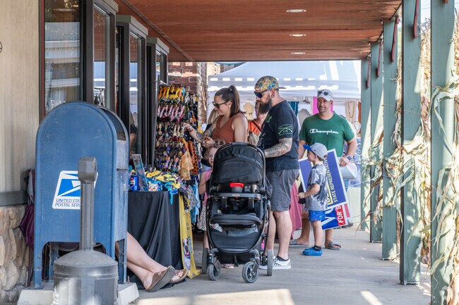 Families come out in the nice weather to enjoy the events at the Evans City Pumpkin Fest.