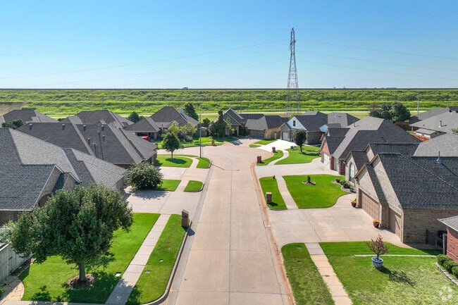 Lush green front yards line the streets of Whitehall.