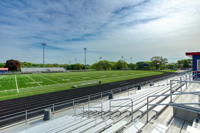 Southgate families sit in the bleachers to watch sports events at Casimir Pulaski High School.