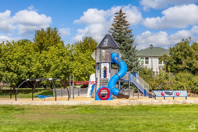 Children stretch their imaginations at the spaceship-themed playground in Quail Crossing Park.