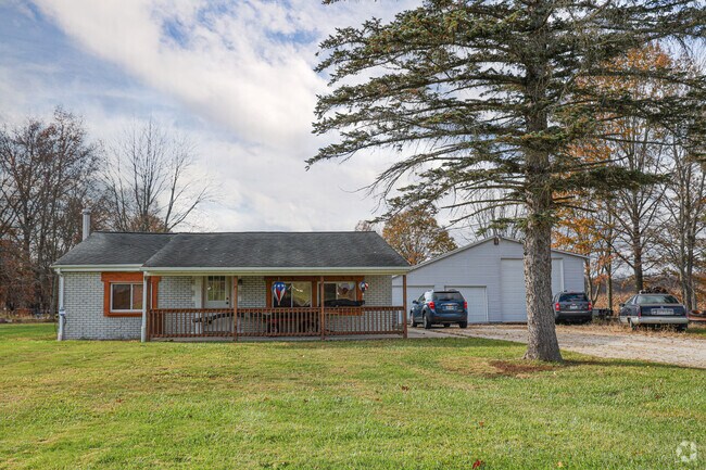 A modest ranch home sets back off of a sleepy country road, in Newton Falls.