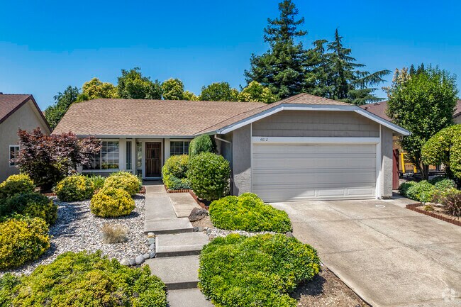 This ranch style home has low maintenance landscaping in Antelope.
